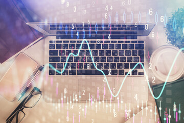 Poster - Multi exposure of financial chart drawing over table background with computer. Concept of research. Top view.