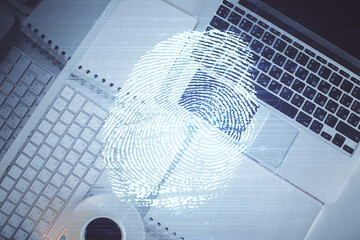 Aufkleber - Finger print over computer on the desktop background. Top view. Double exposure. Concept of securitization.