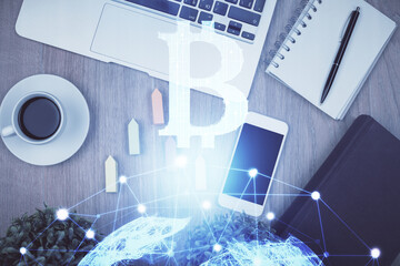 Poster - Double exposure of blockchain theme hologram over table with phone. Top view. Crypto technology concept.