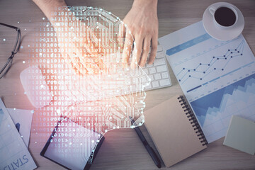 Poster - Double exposure of man's hands typing over computer keyboard and brain hologram drawing. Top view. Ai and data technology concept.