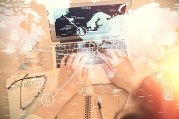 Poster - Double exposure of man's hands typing over computer keyboard and social network theme hologram drawing. Top view. People connection web concept.