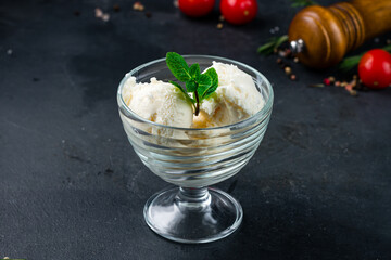 Sticker - Vanilla ice cream with mint in a bowl.