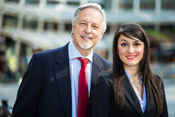 Canvas Print - Business partners outdoor in a modern urban setting in daylight