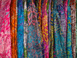Colorful fabrics for sale on a street in Medina of Marrakesh Morocco