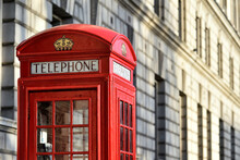Main London Symbols: Red Public Telephone Cabin Nearby Of Westminster Palace In Great Britain.