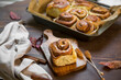 Freshly baked cinnamon and walnuts rolls, deliciously puffy pastry desserts