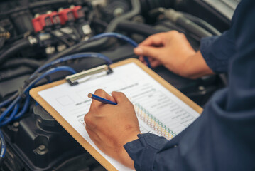 Wall Mural - Close up Man hands fixing Car machinery vehicle mechanical service. Mechanic man hands repairing car auto repair shop. open vehicle hood checking up auto mobile. Vehicle Car maintenance engineer.