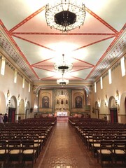 Wall Mural - The interior of the Santa Clara mission church, on the campus of the University of California Santa Clara, was built by Spanish missionaries in an attempt to convert Native Americans to Christianity