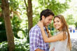 © Jeff B/peopleimages.com - Couple, portrait and hug in park happy, touch and bonding against with love. Date, embrace and man with woman in nature, smile and excited for reunion, relationship and Valentines Day