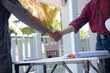 © weerachai - Engineers handshake with architects at the village project construction site.concept business