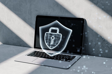 Poster - Close up of laptop computer on desktop with glowing padlock hologram on concrete background. Secure, safety and web concept. 3D Rendering.