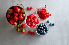 Studio Shot Of Bowls With Various Berry Fruits