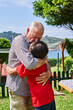 © Cavan Images - Grandson Hugs His Beloved Grandfather