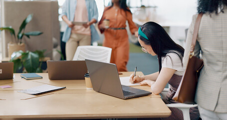 Poster - Asian woman, laptop and writing in notebook for planning strategy, schedule management or finance checklist in office. Employee, reading email communication and notes for creative startup company