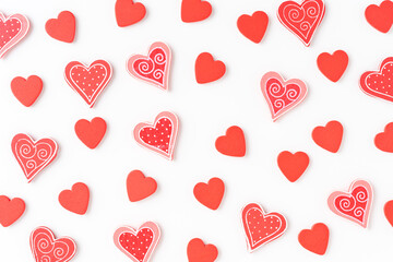 Overhead shot of red hearts on white background. Flat lay