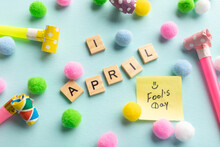 April 1st. Image Of Text April 1 And Festive Decor On The Blue Background. April Fool's Day