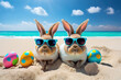 Two Easter bunnies with Easter eggs on the tropical beach. Easter travel vacation. Generative AI