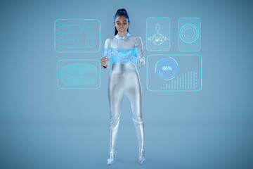 A model dressed as a robot wearing silver, futuristic  clothes holding a virtual  tablet, with virtual icons . A future technology concept