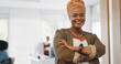 © K Davis/peopleimages.com - Face, leadership and black woman with arms crossed in office ready for targets or goals. Boss, ceo and happy female entrepreneur from South Africa with vision, mission or success mindset in workplace