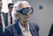© wetzkaz - old woman in office, with VR glasses or medical glasses, Generative AI