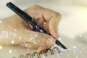 Poster - Double exposure of technology hologram and man hand writing in notebook on background. Research and development software concept