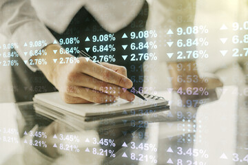 Poster - Double exposure of abstract creative statistics data hologram with man hand writing in notepad on background, analytics and forecasting concept