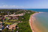 Fototapeta Krajobraz - Imagem aérea da Praia dos Fachos na cidade da Serra no litoral do estado do Espírito Santo. Costa tropical com mata atlântica do Brasil.