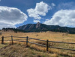 landscape in the flatiron mountains with fence