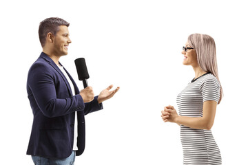 Wall Mural - Male reporter interviewing a young woman