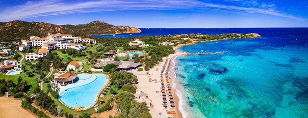 Wall Mural - Italy summer holidyas . Sardegna island - stunning Emerald coast with  beautiful beaches. aerial view of Romazzino beach