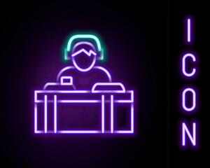 Wall Mural - Glowing neon line DJ wearing headphones in front of record decks icon isolated on black background. DJ playing music. Colorful outline concept. Vector