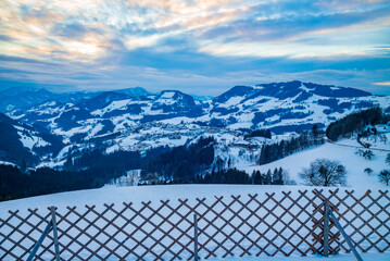 Wall Mural - mountain landscape near the village of maria neustif in upper austria on an evening in winter