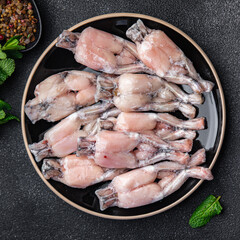 frog leg frozen meat frozen food meal food snack on the table copy space food background rustic top view