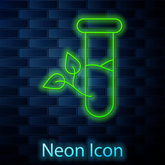 Poster - Glowing neon line Laboratory glass and leaves icon isolated on brick wall background. Chemical test tube with leaf. Eco Lab. Vector