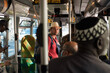 Tourist traveling on public bus in Paris