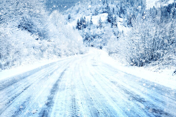Wall Mural - snow covered road in the mountains on snowy day