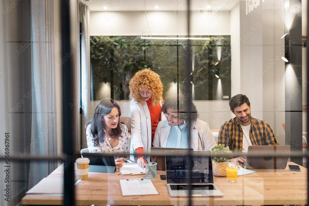 Multiethnic business people working together in the office Stock Photo ...