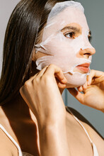A Woman With A Moisturizing Face Mask