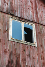 Broken Window In A Old Wooden House