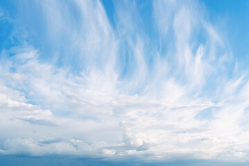Wall Mural - blue sky background with clouds on horizon.
