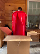 UGC Of Boy Getting Sled Out Of Box