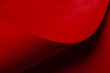© Malin G/Stocksy - Graphic and geometrical red paper curve