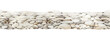 Pebble ground seamless border illustration. Hand drawn pile of pebbles, rocks, small stones watercolor image. Natural landscape element. Pebble-stone background seamless border.