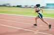 © C. D./peopleimages.com - Black woman, running and athletics for sports training, cross fit or exercise on stadium track in the outdoors. African American female runner athlete in fitness, sport or run for practice workout