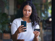 © Nina L/peopleimages.com - Credit card, woman and smartphone for online shopping, outdoor and purchase clothes. Female shopper, lady and customer with cellphone, ecommerce and purchase clothes for sale, discount and in city