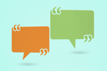 Conceptual image about communication and social media, customer feedback, orange and green speech bubble and quote sign grunge paper cut on grunge blue background
