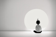 Horizontal Back View Image Of A Child Sitting On A Floor And Looking At The White Empty Wall. Mockup. Copy Space For Your Text. Children's Day. Generative AI