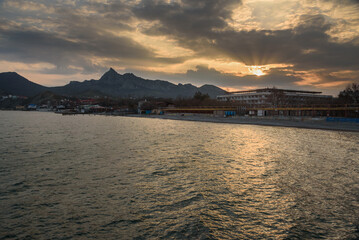 Wall Mural - View of the empty beaches and embankment of resort village of Koktebel. Crimea