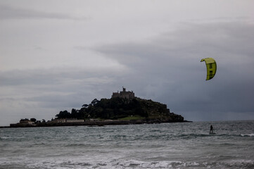 kite surfing next to a castle