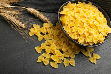 Wall Mural - Raw Farfalle Pasta Isolated, Yellow Dry Noodles, Wheat Bow Macaroni, Uncooked Farfalle